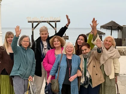 Guests sharing a happy group moment · Spain retreat 2025