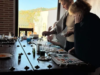 Watercolour guidance at the painting table · Spain retreat 2025
